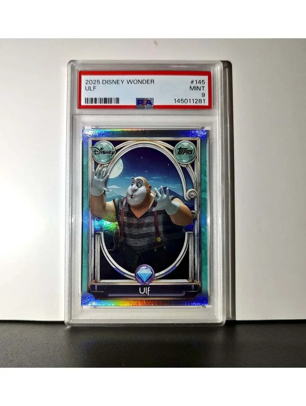 Ulf 2025 Topps Disney Wonder #145 Diamond Card Tangled PSA 9